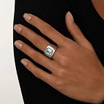 Серебряное кольцо Midnight с голубым фианитом в огранке Эмеральд